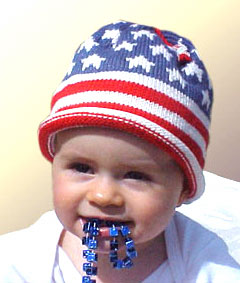 Baby wearing Flag Cap